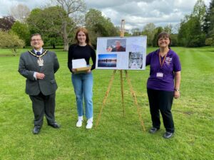 Photograph of Lauren being presented her prize by the Mayor of Wokingham and a representative from Home Start