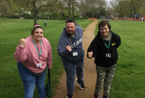 Two learners and their teacher on a sponsored walk