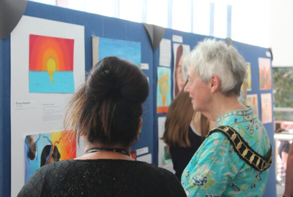 Bina Howard, Curriculum Manager and Councillor Ellen Mac Hale, Bracknell Town Mayor look at the art on display. 