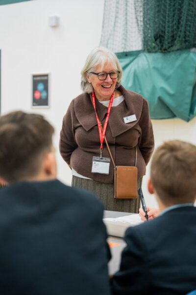 Ann Finlayson, CEO of Sustainability and Environmental Education (SEEd) chatting with school pupils at the Bracknell Forest Council Climate Conference. 