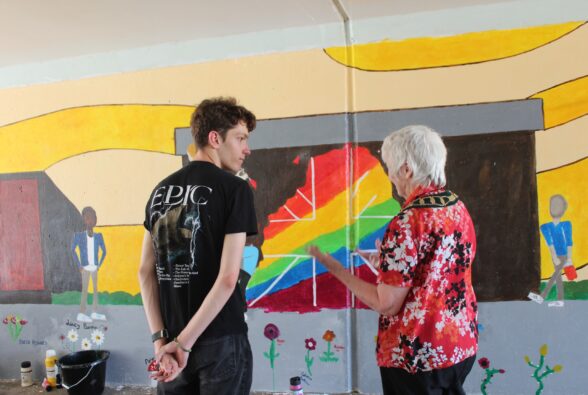 Art student Presley Shearer with Councillor Kathleen Nugent, Bracknell Town Mayor talking about the mural. 